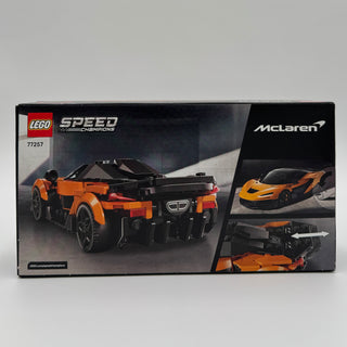 Black box packaging for LEGO Speed Champions McLaren W1 set 77257, featuring orange and black LEGO car model with multiple pr