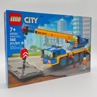 LEGO City Mobile Crane set 60324 box showing yellow and blue crane truck with minifigures and city background.
