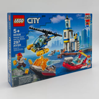 LEGO City Seaside Police and Fire Mission set box showing helicopter, lighthouse, boats, and minifigures against coastal back