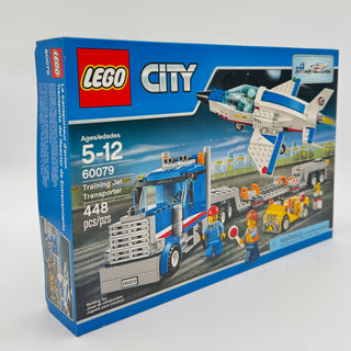 LEGO City Training Jet Transporter set 60079 box showing blue truck, jet, minifigures, and 448 pieces.