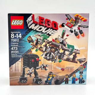 LEGO The Movie Creative Ambush set 70812 box displaying 473 pieces, age 8-14, with black robot and minifigures shown.