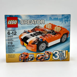 LEGO Creator set 31017 box featuring orange and white convertible sports car with black stripes and detailed interior.