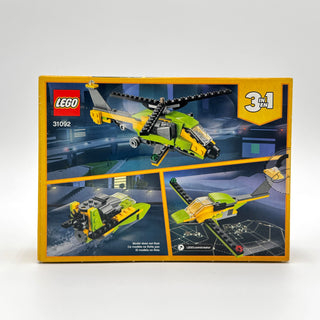 LEGO Creator 31092 set box showing yellow and green helicopter with alternative build configurations displayed on back.