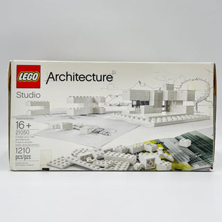 LEGO Architecture Studio set 21050 box showing white bricks, architectural models, and instruction materials.