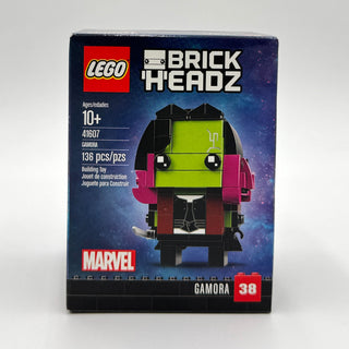 LEGO BrickHeadz Gamora set 41607 box showing green-faced character with black hair and magenta armor.
