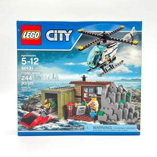 LEGO City Crooks Island set box showing helicopter, police station, red jet ski, and minifigures on rocky island.