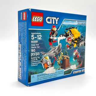 LEGO City Deep Sea Starter Set 60091 box showing minifigures, submarine, shark, and underwater exploration pieces.