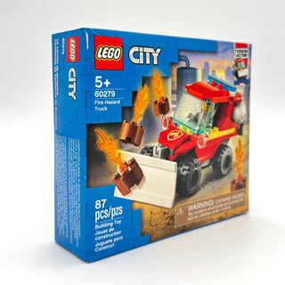 LEGO City Fire Hazard Truck set 60279 box showing red fire truck with flaming debris and minifigure.