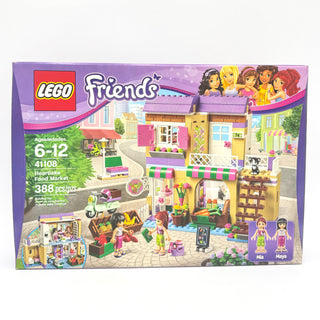 LEGO Friends Heartlake Food Market set 41108 with market stall, minifigures, and accessories on purple packaging.