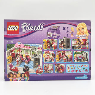 LEGO Friends set 41119 box showing cupcake café building with minifigures, accessories, and multiple scene displays on purple