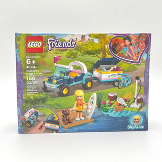 LEGO Friends set 41364 featuring Stephanie minifigure, motorized buggy with trailer, bicycle, and water scene accessories.